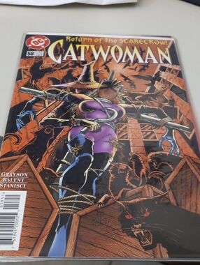 DC Catwoman Comic — Purple & Black with Orange Background